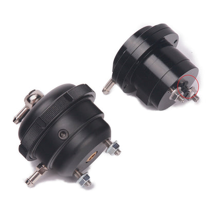 Kinugawa turbo adjustable internal wastegate actuator dustproof cover showing black rubber and metal components for engine protection.