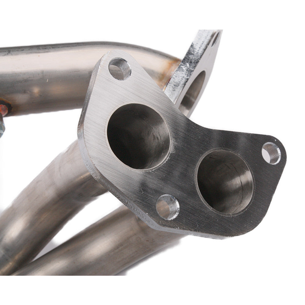 Kinugawa Turbo Subaru WRX and STi EJ25 equal length header manifold showing polished metal pipes and flange connection.